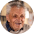 Portrait of elderly man standing indoors at home