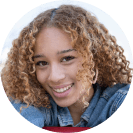 Pretty curly haired happy smiling woman leaning